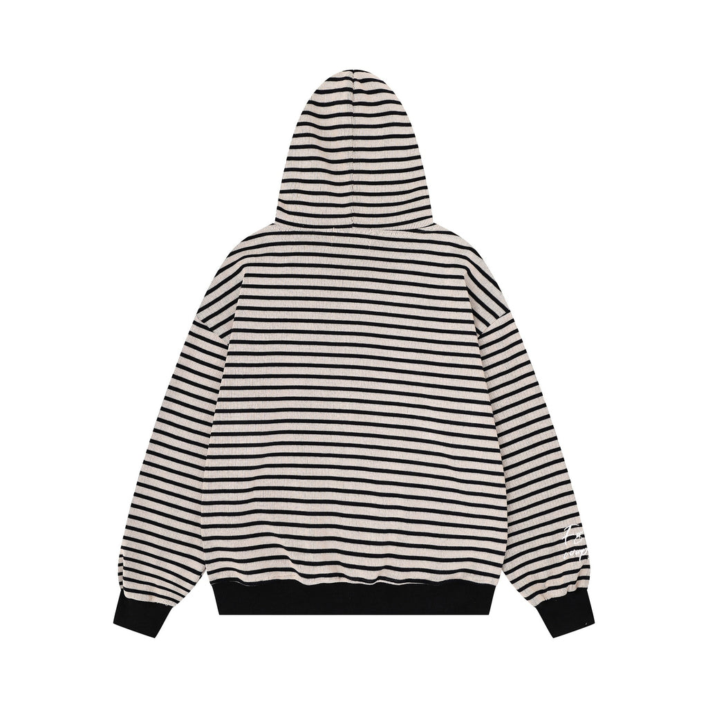 Minimally embroidered sweater with small characters